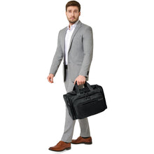 Load image into Gallery viewer, Briggs & Riley Baseline Underseat Duffel - lifestyle carry