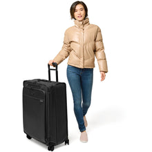 Load image into Gallery viewer, Briggs & Riley Baseline Large Expandable Spinner - lifestyle wheeling