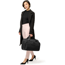 Load image into Gallery viewer, Briggs &amp; Riley Baseline Expandable Cabin Bag - lifestyle carrying
