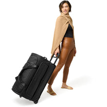 Load image into Gallery viewer, Briggs &amp; Riley Baseline Medium 2 Wheel Duffel - lifestyle wheeling
